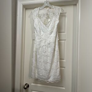 Size 6 wedding dress from David’s Bridal. Cleaned and stored properly.